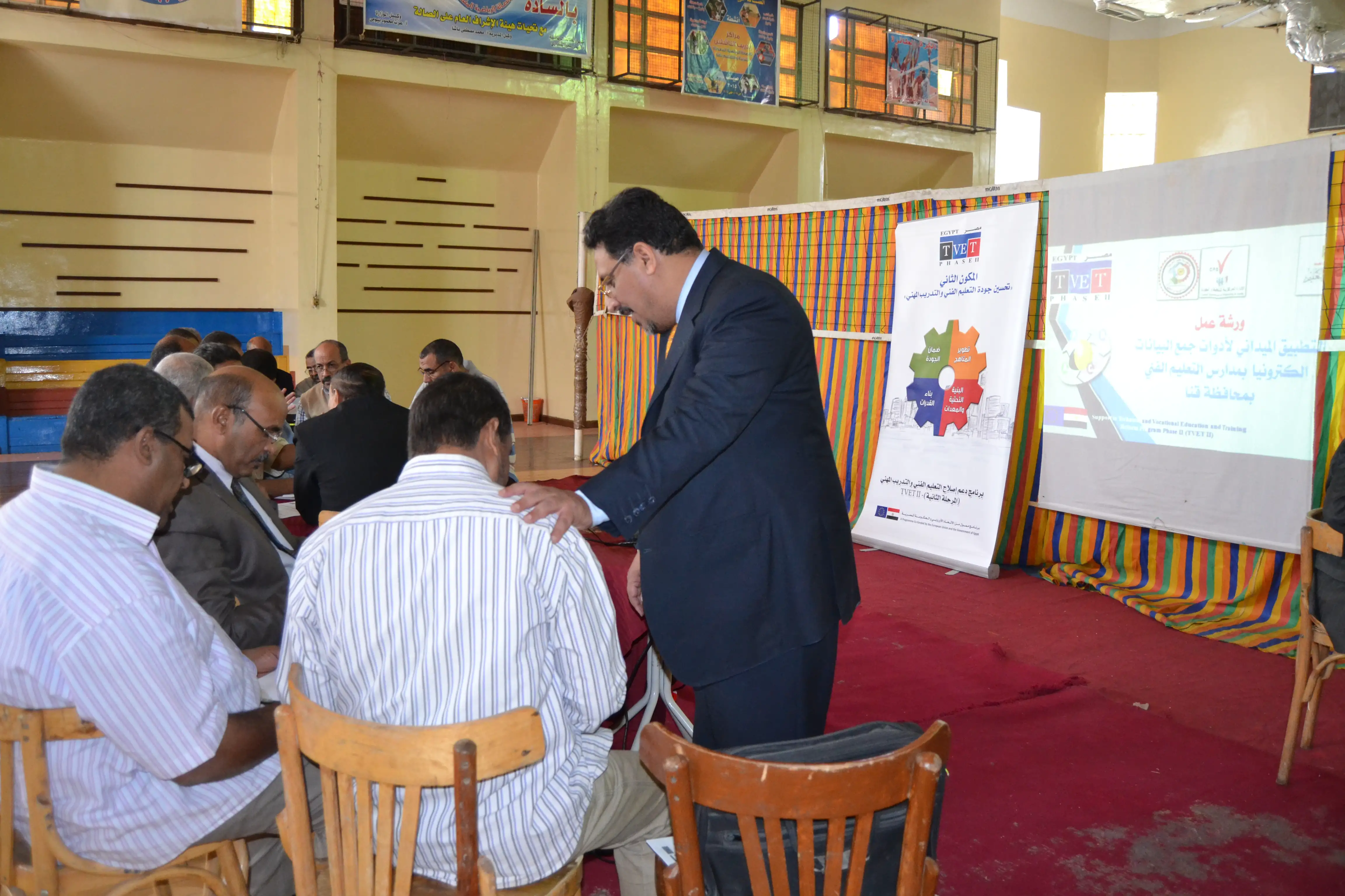 Dr. Mohamed Abdou is helping trainees in a training